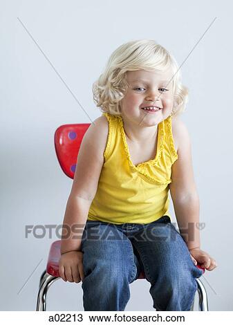 Girl (2-3) girl sitting on chair, smiling, portrait, studio shot View Large Photo Image Stock Image - Girl (2-3) girl sitting on chair, smiling, portrait, studio shot. Fotosearch