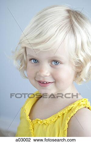 Girl (2-3) wearing yellow shirt, portrait View Large Photo Image Stock Image - Girl (2-3) wearing yellow shirt, portrait. Fotosearch