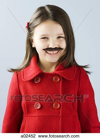 Girl (6-7) in red and fake mustache smiling, portrait View Large Photo Image Stock Image - Girl (6-7) in red and fake mustache smiling, portrait. Fotosearch