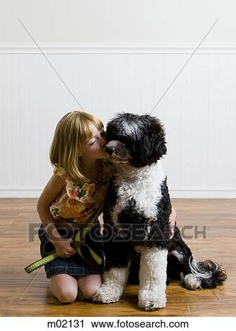 Stock Image - girl and her dog. Fotosearch