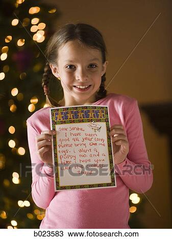 Stock Image - girl at christmas. Fotosearch