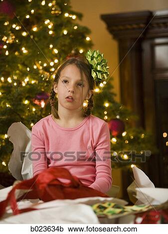 girl at christmas worn out View Large Photo Image Stock Image - girl at christmas worn out. Fotosearch