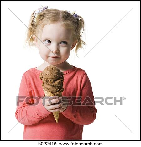 Stock Photography - girl holding an ice cream cone. Fotosearch