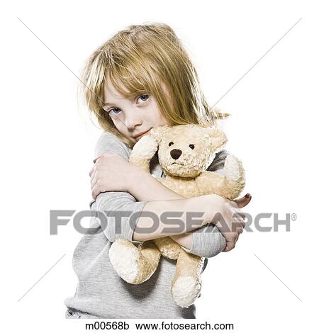 girl hugging her teddy bear View Large Photo Image Stock Image - girl hugging her teddy bear. Fotosearch