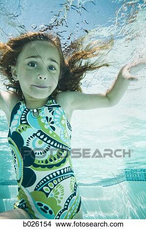 girl in a swimming pool View Large Photo Image Picture - girl in a swimming pool. Fotosearch