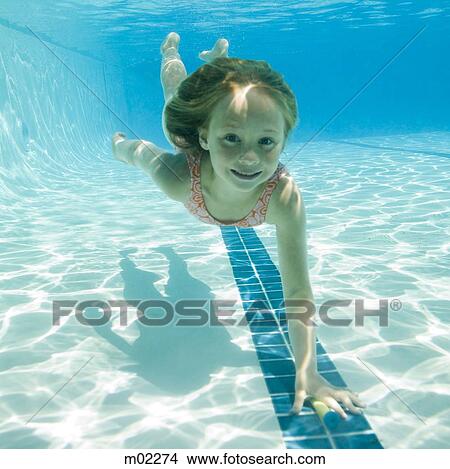 Picture - girl in a swimming pool. Fotosearch
