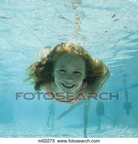 Stock Image - girl in a swimming pool. Fotosearch
