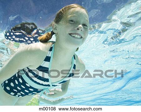 Stock Photo - girl in a swimming pool. Fotosearch