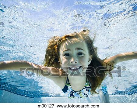 Stock Photo - girl in a swimming pool. Fotosearch