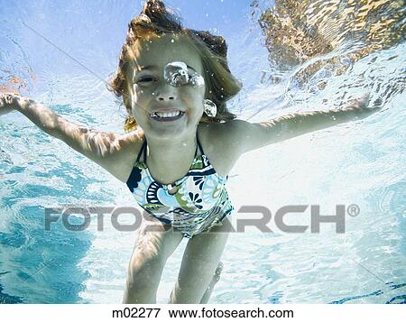 Stock Photo - girl in a swimming pool. Fotosearch