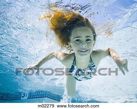 girl in a swimming pool View Large Photo Image Stock Photo - girl in a swimming pool. Fotosearch