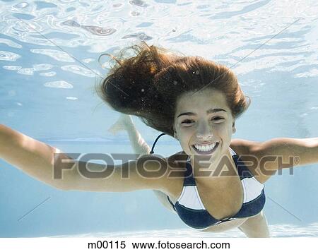 Stock Photography - girl in a swimming pool. Fotosearch