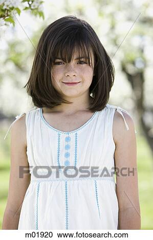 girl in an orchard View Large Photo Image Stock Image - girl in an orchard. Fotosearch