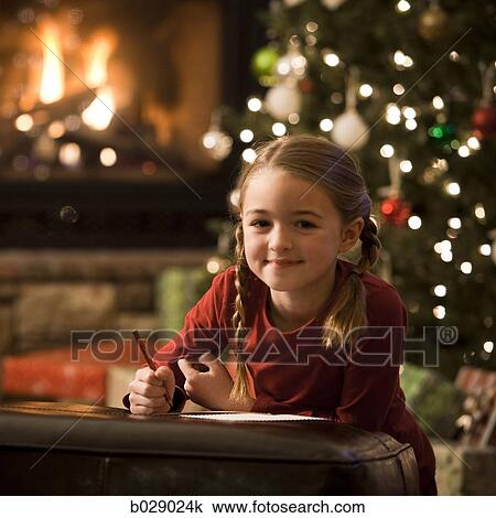 girl writing a letter to santa claus View Large Photo Image Stock Image - girl writing a letter to santa claus. Fotosearch