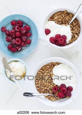 Healthy breakfast with cereals and fresh raspberries, studio shot View Large Photo Image Stock Photograph - Healthy breakfast with cereals and fresh raspberries, studio shot. Fotosearch