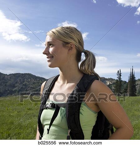 Stock Photograph - hiker on a mountain path. Fotosearch