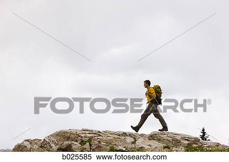 hiker on a ridge View Large Photo Image Stock Photography - hiker on a ridge. Fotosearch