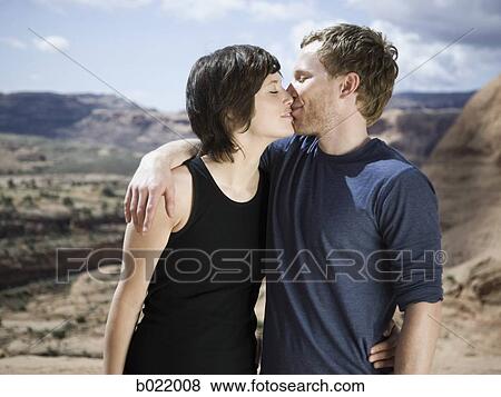 Stock Photo - hikers in the desert. Fotosearch