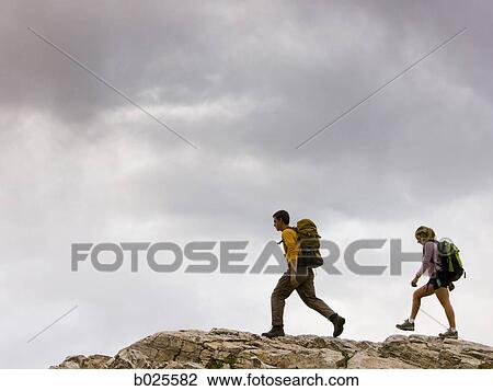 hikers on a ridge View Large Photo Image Stock Image - hikers on a ridge. Fotosearch