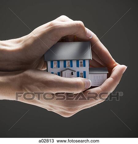 House in young woman's hands View Large Photo Image Stock Image - House in young woman's hands. Fotosearch