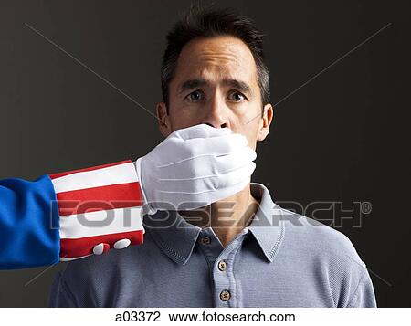 Human hand in Uncle Sam's costume shielding man's mouth, studio shot View Large Photo Image Stock Image - Human hand in Uncle Sam's costume shielding man's mouth, studio shot. Fotosearch