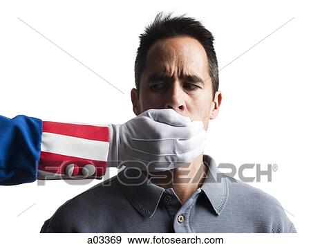 Human hand in Uncle Sam's costume shielding man's mouth, studio shot View Large Photo Image Stock Photo - Human hand in Uncle Sam's costume shielding man's mouth, studio shot. Fotosearch