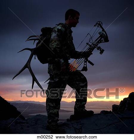 hunter against a sunset View Large Photo Image Stock Image - hunter against a sunset. Fotosearch