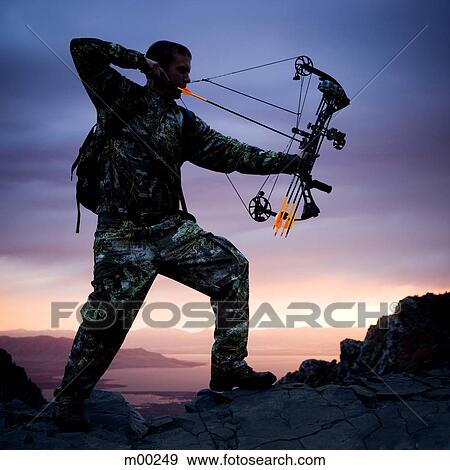 hunter against a sunset View Large Photo Image Stock Photo - hunter against a sunset. Fotosearch