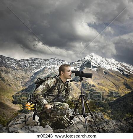 hunter using binoculars to spot prey View Large Photo Image Stock Image - hunter using binoculars to spot prey. Fotosearch