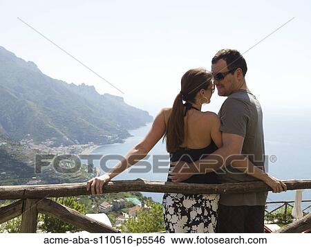 Italy, Amalfi Coast, Ravello, Mature couple standing together, coastline in background View Large Photo Image Stock Photograph - Italy, Amalfi Coast, Ravello, Mature couple standing together, coastline in background. Fotosearch