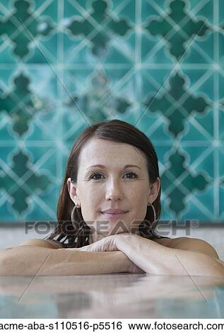Italy, Amalfi Coast, Ravello, Portrait of mature woman in swimming pool View Large Photo Image Stock Photograph - Italy, Amalfi Coast, Ravello, Portrait of mature woman in swimming pool. Fotosearch