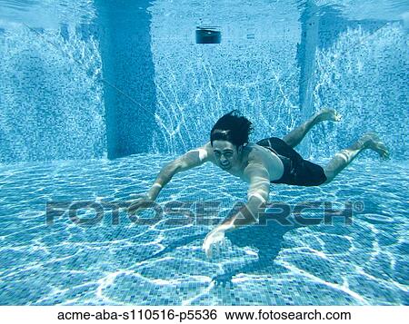 Italy, Amalfi Coast, Ravello, Young man swimming underwater View Large Photo Image Stock Photograph - Italy, Amalfi Coast, Ravello, Young man swimming underwater. Fotosearch
