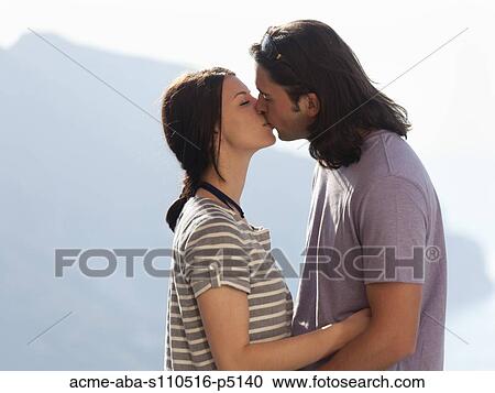 Italy, Amalfi Coast, Ravello, Young couple kissing View Large Photo Image Stock Image - Italy, Amalfi Coast, Ravello, Young couple kissing. Fotosearch