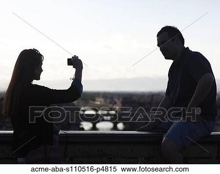 Italy, Florence, Couple on bridge over River Arno View Large Photo Image Stock Photography - Italy, Florence, Couple on bridge over River Arno. Fotosearch