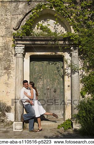 Stock Image - Italy, Ravello, Couple flirting. Fotosearch