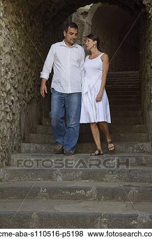 Italy, Ravello, Couple walking on stairs View Large Photo Image Stock Photo - Italy, Ravello, Couple walking on stairs. Fotosearch