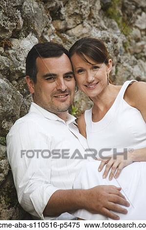 Italy, Ravello, Mature couple embracing against stone wall View Large Photo Image Stock Photography - Italy, Ravello, Mature couple embracing against stone wall. Fotosearch