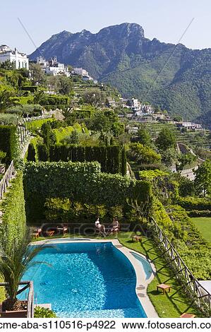 Italy, Ravello, Terrace with outdoor pool and couple View Large Photo Image Stock Image - Italy, Ravello, Terrace with outdoor pool and couple. Fotosearch