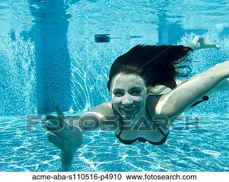 Italy, Ravello, Underwater portrait of swimming woman View Large Photo Image Stock Image - Italy, Ravello, Underwater portrait of swimming woman. Fotosearch