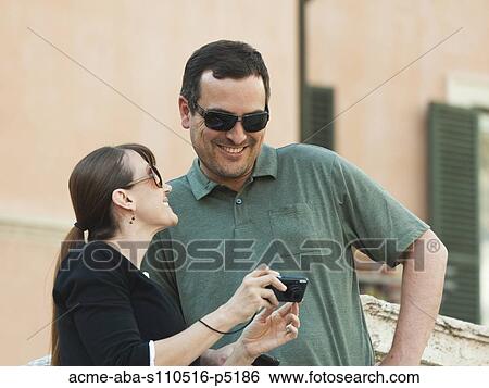 Italy, Rome, Spanish Steps, Couple using camera View Large Photo Image Stock Photograph - Italy, Rome, Spanish Steps, Couple using camera. Fotosearch