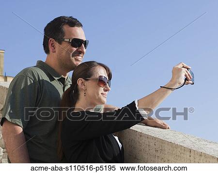Italy, Rome, Spanish Steps, Couple photographing themselves View Large Photo Image Stock Photography - Italy, Rome, Spanish Steps, Couple photographing themselves. Fotosearch