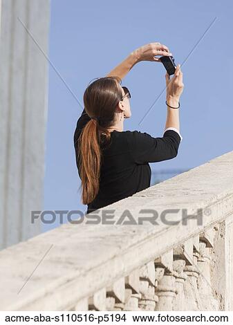Italy, Rome, Spanish Steps, Rear view of woman photographing herself View Large Photo Image Picture - Italy, Rome, Spanish Steps, Rear view of woman photographing herself. Fotosearch