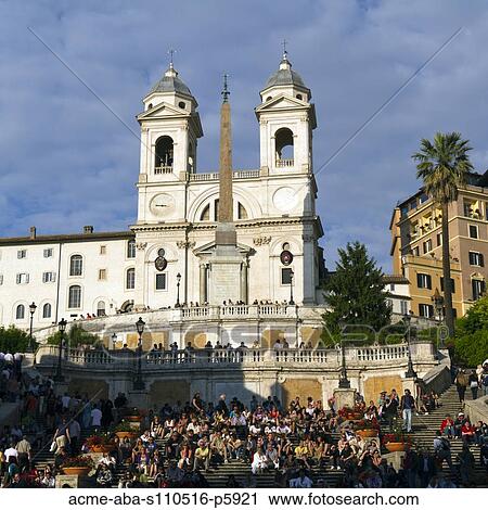 Italy, Rome, Tourists on Spanish Steps at sunset, church of the Santissima Trinita dei Monti in background View Large Photo Image Stock Image - Italy, Rome, Tourists on Spanish Steps at sunset, church of the Santissima Trinita dei Monti in background. Fotosearch