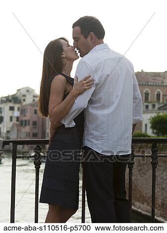 Italy, Venice, Mature couple kissing on bridge View Large Photo Image Stock Image - Italy, Venice, Mature couple kissing on bridge. Fotosearch
