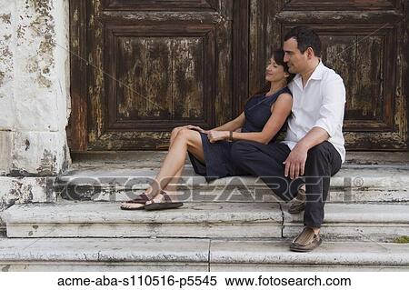 Italy, Venice, Mature couple sitting together at steps View Large Photo Image Stock Photography - Italy, Venice, Mature couple sitting together at steps. Fotosearch