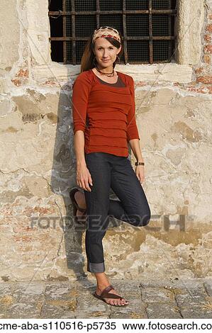 Italy, Venice, Mature woman leaning by old wall View Large Photo Image Stock Photography - Italy, Venice, Mature woman leaning by old wall. Fotosearch