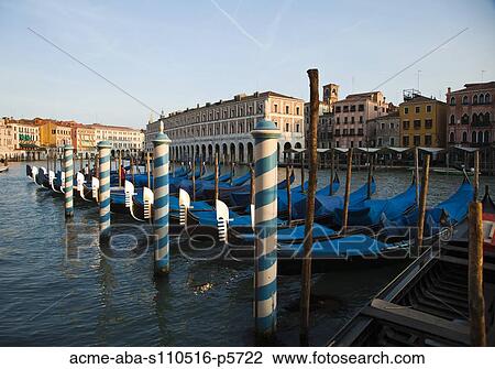 Italy, Venice, Row of blue gondolas moored at pier View Large Photo Image Stock Image - Italy, Venice, Row of blue gondolas moored at pier. Fotosearch