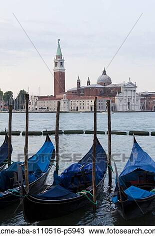 Italy, Venice, San Giorgio Maggiore church seen across lagoon, gondolas in foreground View Large Photo Image Stock Image - Italy, Venice, San Giorgio Maggiore church seen across lagoon, gondolas in foreground. Fotosearch