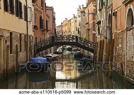 Italy, Venice, Scenic view of bridge above canal View Large Photo Image Stock Photo - Italy, Venice, Scenic view of bridge above canal. Fotosearch