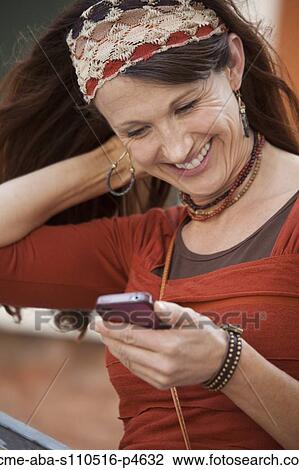 Italy, Venice, Woman text messaging using mobile phone View Large Photo Image Stock Image - Italy, Venice, Woman text messaging using mobile phone. Fotosearch